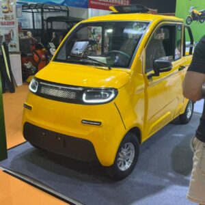 Yellow low-speed electric mini vehicle 4-wheel EV for city commuting